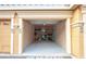 Reserved single-car garage with ample shelving for additional storage space at 2741 Via Cipriani # 931A, Clearwater, FL 33764