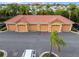 Reserved parking space in front of garage; well-maintained exteriors and landscaping at 2741 Via Cipriani # 931A, Clearwater, FL 33764