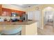 Well-lit kitchen featuring ample countertops and stainless steel appliances at 2741 Via Cipriani # 931A, Clearwater, FL 33764