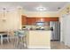 Well-equipped kitchen featuring stainless steel appliances and granite countertops at 2741 Via Cipriani # 931A, Clearwater, FL 33764