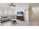 Comfortable living room with stylish decor, tile flooring, and plenty of natural light at 2741 Via Cipriani # 931A, Clearwater, FL 33764