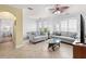 Spacious living room provides natural light, tile floors, and easy kitchen access at 2741 Via Cipriani # 931A, Clearwater, FL 33764