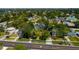 Aerial view of the property highlighting its location with mature trees and convenient street access at 311 83Rd Ne Ave, St Petersburg, FL 33702