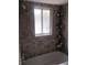 Bathroom with tile shower at 3206 W Azeele St # 226, Tampa, FL 33609