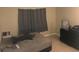 Bedroom with tile floors, a large window, and a dresser at 3206 W Azeele St # 226, Tampa, FL 33609