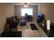Comfortable living room featuring tile flooring and plenty of natural light at 3206 W Azeele St # 226, Tampa, FL 33609