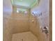 Shower room featuring a tile surround and overhead shower at 336 Silver Falls Dr, Apollo Beach, FL 33572
