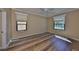 Bedroom with hardwood floors and natural light at 336 Silver Falls Dr, Apollo Beach, FL 33572