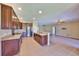 Spacious open floorplan featuring stainless appliances and granite countertops in the kitchen at 336 Silver Falls Dr, Apollo Beach, FL 33572