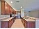 Updated kitchen with stainless steel appliances, granite countertops, and a breakfast bar at 336 Silver Falls Dr, Apollo Beach, FL 33572