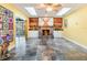 Inviting living room boasts a fireplace, built-in shelves, and lots of natural light from above at 402 S Barbara Ln, Tampa, FL 33609