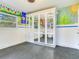 Workout room features large mirrored closets, painted murals, and ample floor space at 402 S Barbara Ln, Tampa, FL 33609
