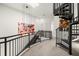 Hallway features a spiral staircase and modern artwork at 4118 Gauge Line Loop, Tampa, FL 33624