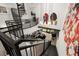 Overhead view of open plan with second story spiral staircase and hanging decorative lights at 4118 Gauge Line Loop, Tampa, FL 33624