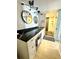 Sleek bathroom with black marble counters and a walk-in shower at 4141 Bayshore Blvd # 1103, Tampa, FL 33611