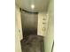 Modern shower with black mosaic tile flooring and a glass door entry at 4141 Bayshore Blvd # 1103, Tampa, FL 33611