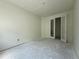 Bedroom featuring a closet with modern door leading to a quiet, private space at 4244 11Th N Ave, St Petersburg, FL 33713