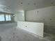 Spacious kitchen area ready for customization with new windows and in-island outlet at 4244 11Th N Ave, St Petersburg, FL 33713