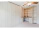 Bedroom with built in closet, desk and drawers, and a neutral carpet at 428 Moorings Cove Dr # 7F, Tarpon Springs, FL 34689