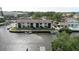 Charming waterfront condo with private boat dock offers an idyllic coastal lifestyle at 428 Moorings Cove Dr # 7F, Tarpon Springs, FL 34689