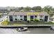 Waterfront condo has a private boat dock and lush landscaping for relaxed coastal living at 428 Moorings Cove Dr # 7F, Tarpon Springs, FL 34689