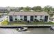 Waterfront condo has a private boat dock and lush landscaping for relaxed coastal living at 428 Moorings Cove Dr # 7F, Tarpon Springs, FL 34689