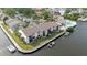 Waterfront condos with boat docks, grassy lawns, and community pool offer an attractive coastal living experience at 428 Moorings Cove Dr # 7F, Tarpon Springs, FL 34689
