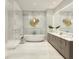 Elegant bathroom with a soaking tub, a glass-enclosed shower, and dual vanities at 520 N Tampa St # 1508, Tampa, FL 33602