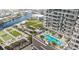 Luxury rooftop pool with city and river views, surrounded by lounge chairs and lush landscaping at 520 N Tampa St # 1508, Tampa, FL 33602