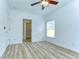 Bright bedroom featuring wood-look floors, a closet, a window, and neutral paint at 538 Summer Sails Dr, Valrico, FL 33594