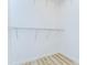 Walk-in closet featuring wire shelving and wood-look floors at 538 Summer Sails Dr, Valrico, FL 33594