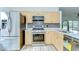 Well-equipped kitchen with stainless steel appliances, stone countertops, and sleek modern design for easy cooking at 538 Summer Sails Dr, Valrico, FL 33594