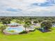Aerial view of community pool and playground area with lush landscaping at 538 Summer Sails Dr, Valrico, FL 33594