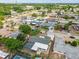 An aerial view of a home with pool in a mature neighborhood at 5810 8Th Ave, New Port Richey, FL 34652