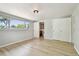 Spacious bedroom with wood floors and windows bringing in natural light at 5810 8Th Ave, New Port Richey, FL 34652