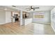 Open floor plan featuring a view of the kitchen, dining room and stainless steel appliances at 5810 8Th Ave, New Port Richey, FL 34652