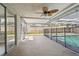 This lanai has a screen enclosure, offering a relaxing retreat at 5810 8Th Ave, New Port Richey, FL 34652