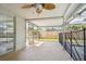 Spacious covered patio with a ceiling fan, perfect for enjoying the outdoors at 5810 8Th Ave, New Port Richey, FL 34652