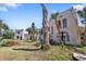 Backyard featuring a decaying stucco home at 636 Sunset S Dr, St Petersburg, FL 33707