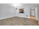 Open dining room featuring tile floors, chandelier and a pass-through to the kitchen at 8765 Bardmoor Blvd # 107, Seminole, FL 33777