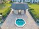 Aerial view of community hot tub and enclosure at this property at 8765 Bardmoor Blvd # 107, Seminole, FL 33777