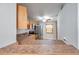 Efficient kitchen layout with stainless steel appliances and a tiled backsplash at 8765 Bardmoor Blvd # 107, Seminole, FL 33777