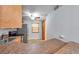 Efficient kitchen layout with stainless steel appliances and a tiled backsplash at 8765 Bardmoor Blvd # 107, Seminole, FL 33777