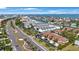 Community aerial view showcasing the residences, landscaping, and proximity to the water at 903 Pinellas Bayway S # 308, Tierra Verde, FL 33715