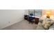 Cozy bedroom with desk, sofa and natural light at 903 Pinellas Bayway S # 308, Tierra Verde, FL 33715