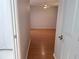 Spacious bedroom featuring hardwood floors, neutral paint, and ceiling fan at 9304 Nile Dr, New Port Richey, FL 34655