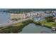 Scenic aerial view of waterfront condos, showcasing its desirable location and picturesque surroundings at 100 Bluff View Dr # 510A, Belleair Bluffs, FL 33770