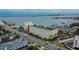 Stunning aerial view of waterfront condos with scenic bay and city views at 100 Bluff View Dr # 510A, Belleair Bluffs, FL 33770