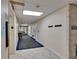 Hallway showing units and elevator access at 100 Bluff View Dr # 510A, Belleair Bluffs, FL 33770