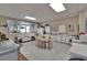 Community kitchen with stainless appliances, an island, and dining area at 100 Bluff View Dr # 510A, Belleair Bluffs, FL 33770